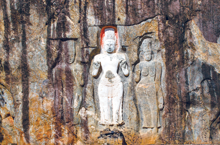 The crowned figure at the centre of the group is thought to be Maitreya, the future Buddha. To his left stands Vajirapani, the figure to the left may be either Vishnu or Sahampath Brahma 