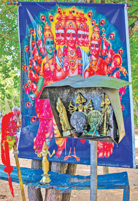The God Skanda or Kataragama Deviyo represents six faces and 12 hands and his vehicle is a peacock