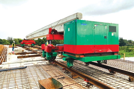 Special equipment brought by the Malaysian contractor to transport concrete beams