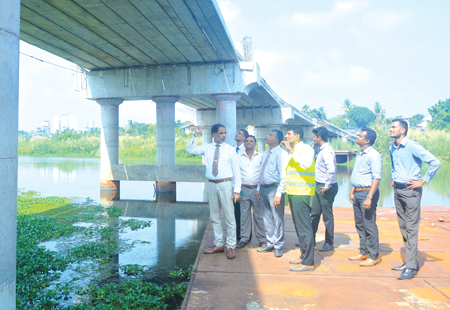 Chairman, State Development and Construction Corporation, Kushan Devinda instructs officials on construction work