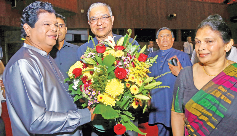  Indian High Commissioner Santhosh Jha wishes Minister Dr. Bandula Gunawardena on his birthday. MP Wajira Abeywardena and Mrs. Tamara Gunawardena look on.