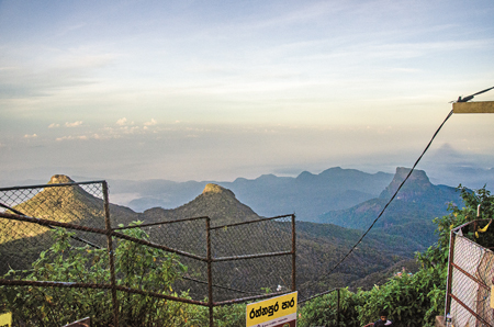 ‘Bena Samanala’ the twin peaks that stand to the right of Kunudiya Parwathaya hill.