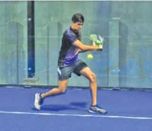 A player in action at Padel tennis