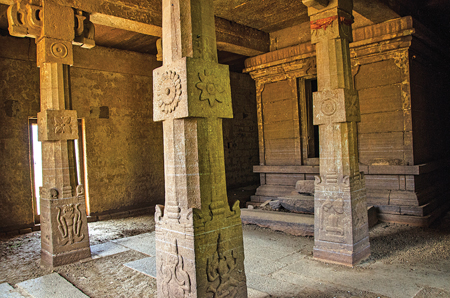 Inside of the ruined Hindu temple seen today with decorated stone columns