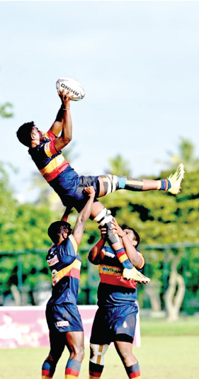 Thurstan College flanker Chanithu Perera is hoisted to grab the ball in a line-out thrown-in against St. Joseph’s College
