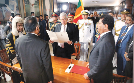 Ranil Wickremesinghe is being sworn in as the eighth Executive President of the Democratic Socialist Republic of Sri Lanka
