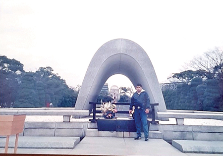 The writer of this article standing in front of the Cenotaph, Hiroshima Peace Park