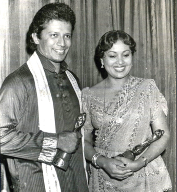 Malini and Vijaya Kumaratunga pose with awards