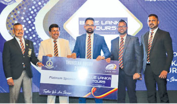 Thurstan Principal Pamuditha Wickramasingha (second from left) receiving the platinum sponsorship from Blue Lanka Tours(Pix by Rukmal Gamage)