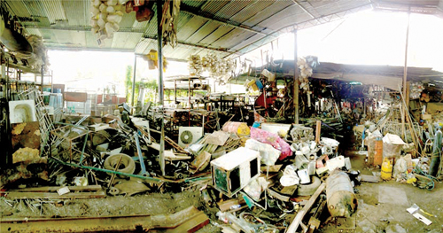 Door-to-door collectors separate what is valuable and sell it to junk shops