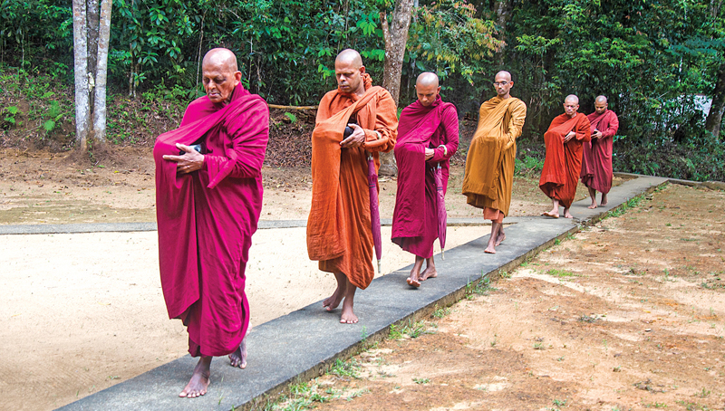 The two main meals at the hermitage – breakfast and lunch – are provided by alms donors; the bhikkhus receive food in their bowls and confer merit on the donors. These monastic bhikkhus are engaged in ‘Pindapatha’ at the Kalugala forest hermitage in Baduraliya
