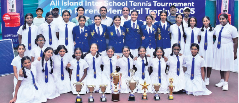 The Musaeus College Tennis Team with SLTA President Iqbal Bin Issack and General Secretary Pradeep Gunasekara