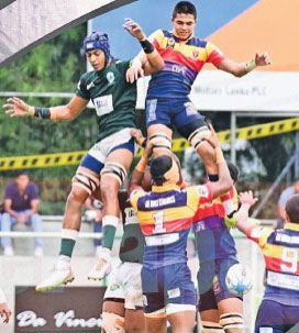Action from the match between Trinity and Isipathana