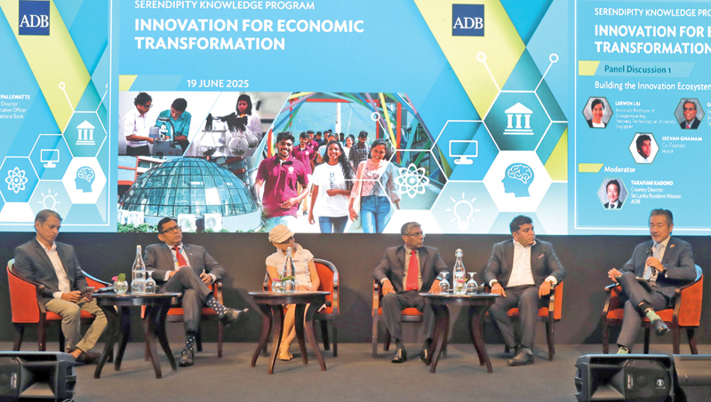 From Left: Heminda Jayaweera (Executive Director TRACE / Cofounder 3H), Damith Pallewatte (Managing Director/Chief Executive Officer, Hatton National Bank), Lerwen Liu (Associate Professor of Entrepreneurship, Nanyang Technological University, Singapore), Gomika Udugamasooriya (Senior Advisor to the President of Sri Lanka on Science and Technology), Jeevan Gnanam (Co-founder, Hatch), and Takafumi Kadono (Country Director for Sri Lanka, ADB), engaged in a panel discussion regarding building the Innovation Eco-system during the Serendipity Knowledge Program, Innovation for Economic Transformation.