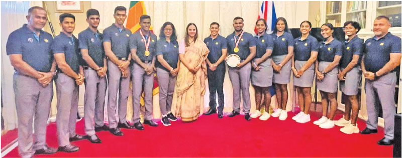 The Sri Lanka Lifesaving teams with the Deputy High Commissioner for Sri Lanka in the United Kingdom Manorie Mallikaratchy
